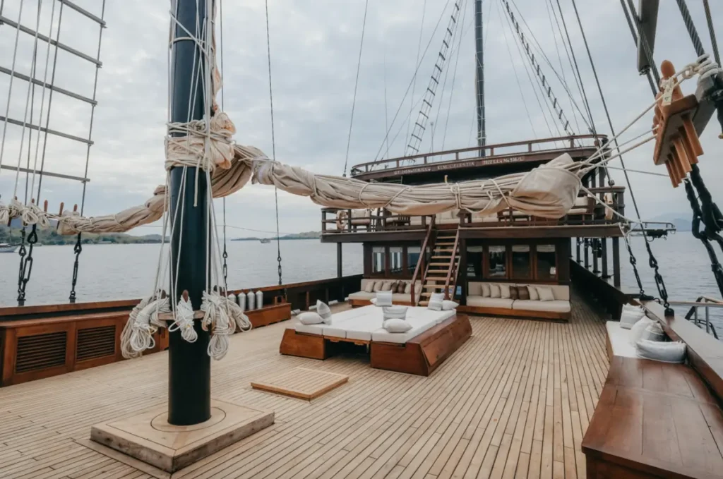 Open and roomy wooden deck of a luxury Komodo liveaboard